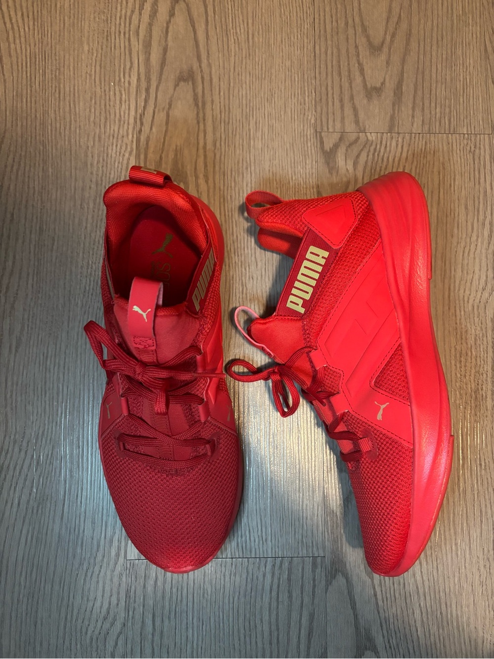 Women’s Puma red and gold sneakers size 8.5